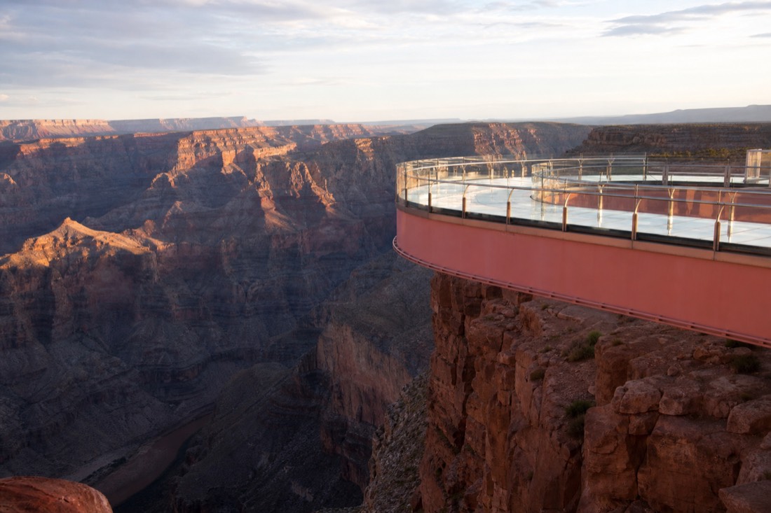 The glass Skywalk bridge curving out over the West Rim of the Grand Canyon on Hualapai land